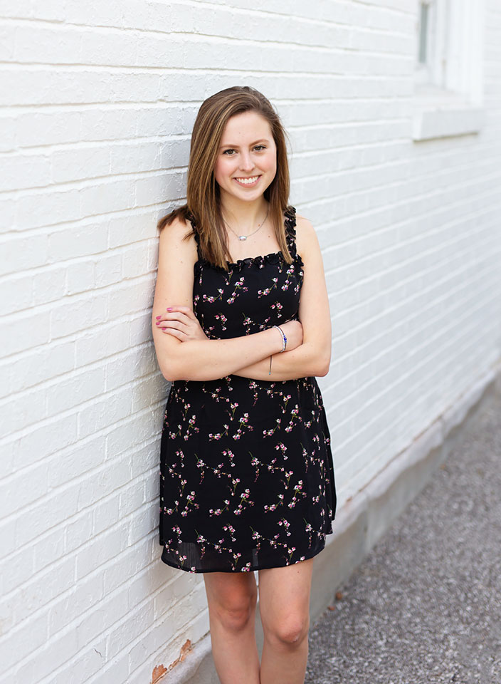 high school girl posing for senior pictures in Hudson Ohio