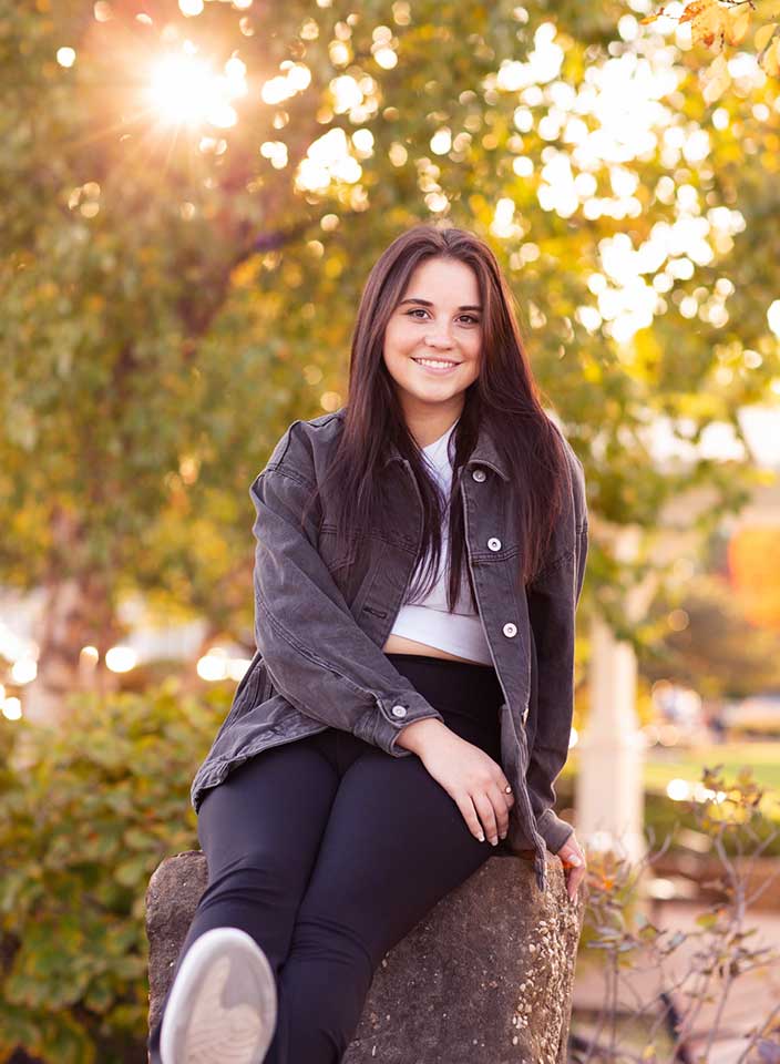 high school girl posing for senior pictures in Hudson Ohio