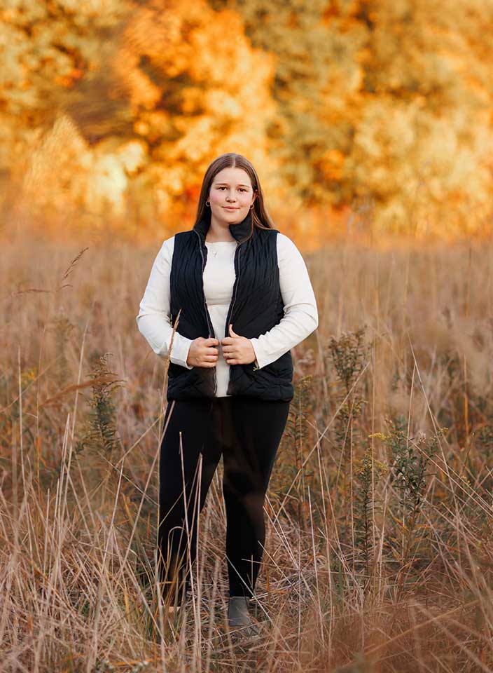 high school senior girl posing for senior photos