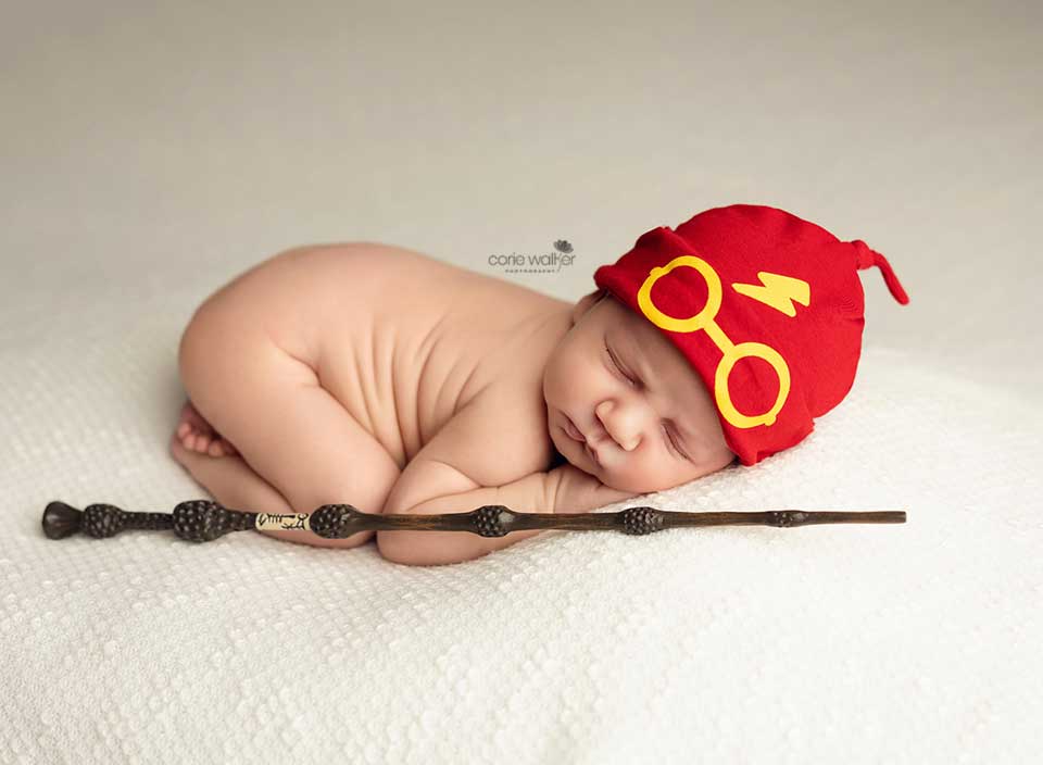 newborn baby sleeping in hat