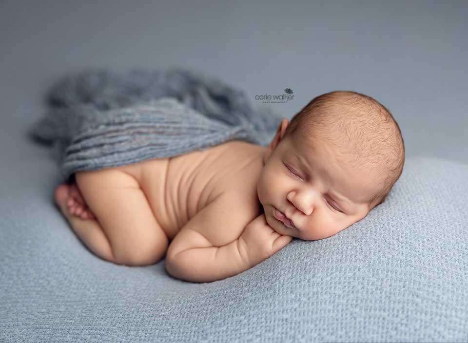 newborn baby sleeping for photo